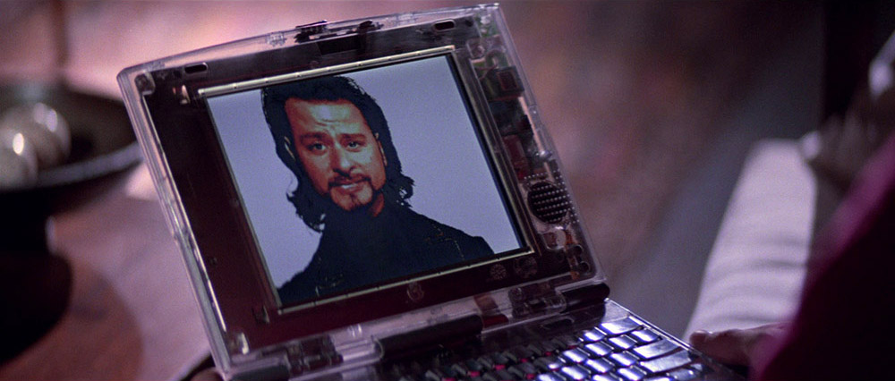 Translucent laptop from the film playing a video of “The Plague.”