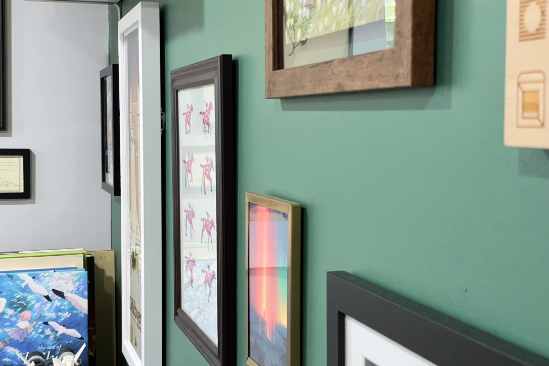 extreme angle close up of frame edges along green wall